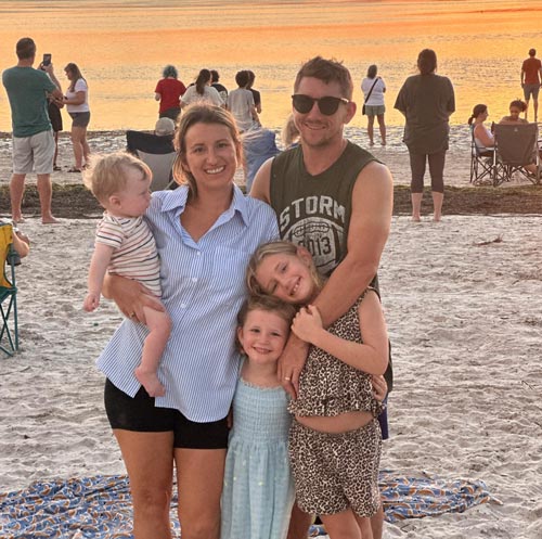 Owner Joel Ferguson and family at the beach. 